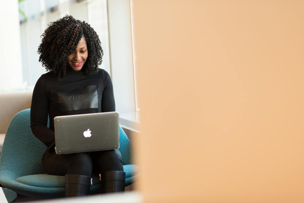 Email marketing Woman Holding Macbook